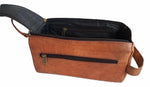 Brown leather bag with a zipper on a white background