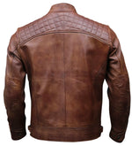 Brown leather jacket with quilted shoulder design on a white background