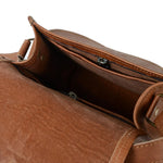 Brown leather bag with open flap showing interior.