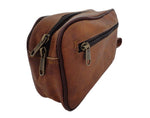 Brown leather bag with black zipper on a white background