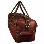 Brown leather duffel bag on a white background