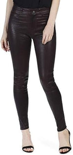 Black leather pants worn by a person on a white background