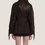 Brown suede jacket with fringe details on a plain background